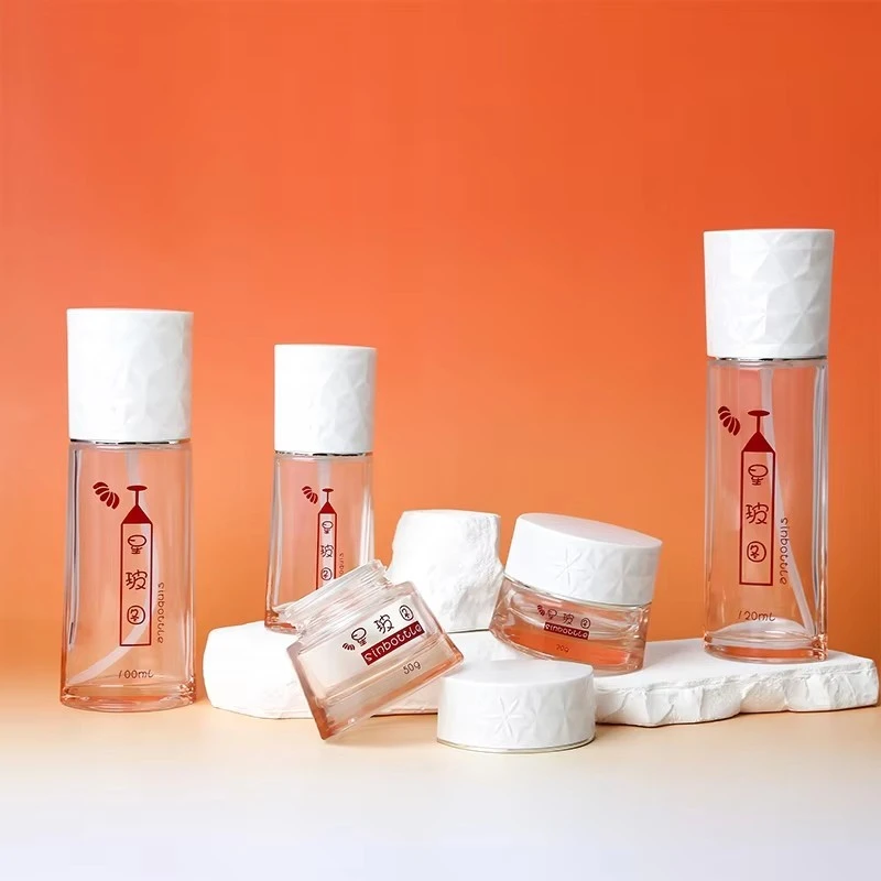 Luxury 50ml 100ml Round Glass Bottles Set For Face Cream Lotion Empty Spray Bottle With Airless Pump Custom Cosmetic Packaging best
